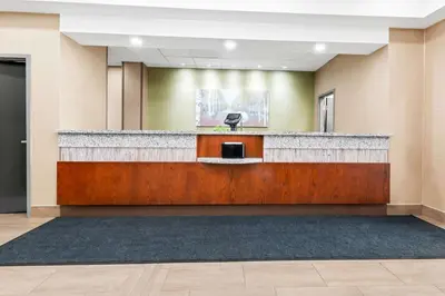 a lobby of a hospital with a reception desk at Best Western Plus Fergus Hotel in Fergus