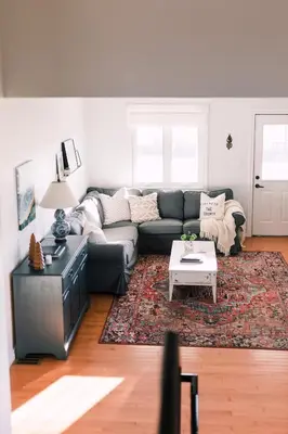 a living room with a couch and a coffee table at Fox Lane - Prince Edward County Farmhouse in Picton
