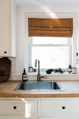 a kitchen sink in a kitchen with a window at Hart House a fresh 3 bedroom century home in Cherry Valley