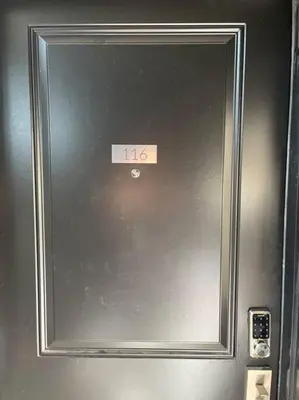 a door of a refrigerator with a sign on it at Lovely one bedroom condo with free parking in Niagara Falls