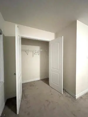an empty room with a closet with a door at Niagara Falls BNB 15 mins away from Falls in Thorold
