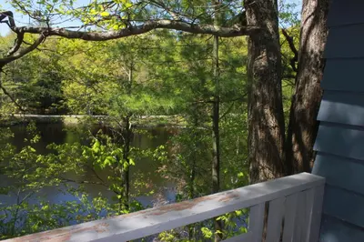 a view from the porch of a house overlooking a lake at Trillium Resort & Spa in Port Sydney