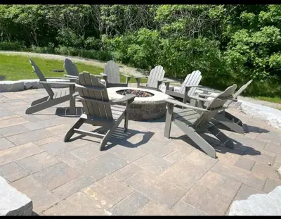 a group of chairs sitting around a fire pit at Margarita Vacation Getaway in Oro-Medonte