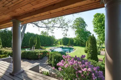 a view of a garden from the porch of a house at Bramasole Bed and Breakfast in Roseneath