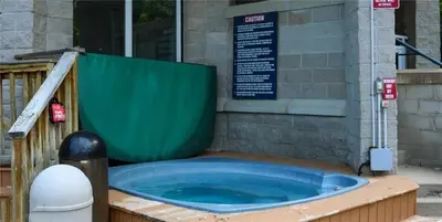 a large blue tub sitting in front of a building at Blue Mountain at your Door Step in Blue Mountains
