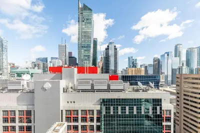 a view of a city skyline with tall buildings at Luxury King Bed Condo with Stunning City Views in Toronto