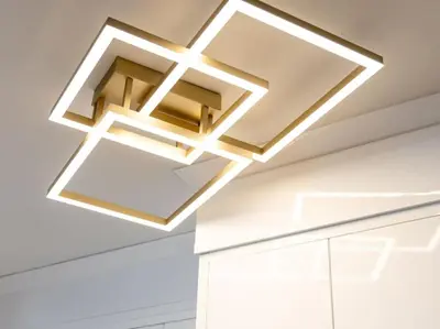 a light fixture on the ceiling of a room at Pristine Modern 2BR Condo Private BBQ and Balcony in Toronto
