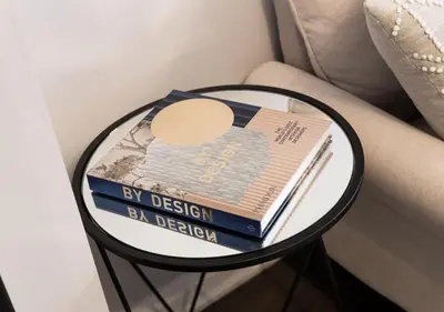 a side table with two books on top of it at One of Toronto s finest 1BR Condo with a WFH Setup in Toronto