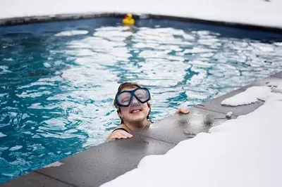 a young child wearing goggles in a swimming pool at Lakehurst Estate in Cobourg