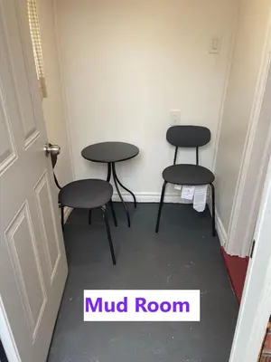 two tables and two chairs in a room at BUDGET Quad Room with En Suite Bathroom 36B in Toronto