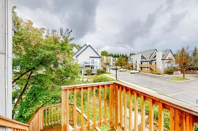 a wooden deck in a residential neighborhood with houses at Condo 612 at North Creek Resort in Blue Mountains