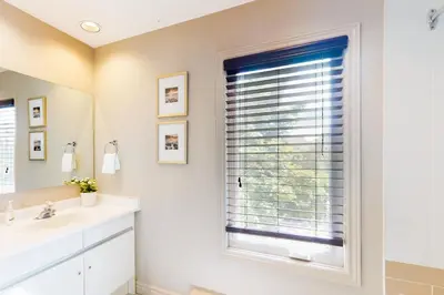 a bathroom with a sink and a window at Sierra Lane 105 in Blue Mountains