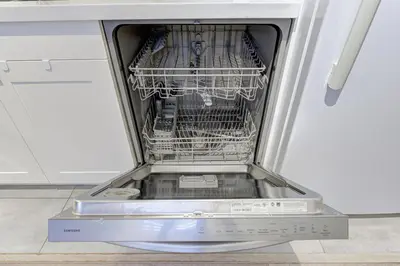 an empty dishwasher with its door open in a kitchen at Niagara Falls-Toronto-45 Min Drive- 26 OOOO75-Max 8 in Hamilton