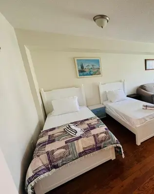 a bedroom with two beds in a room at Beautiful Townhouse In Toronto in Toronto