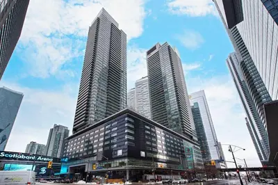a group of tall buildings in a city at Luxury Downtown Toronto 2 Bedroom Suite with City and Lake Views and Free Parking in Toronto