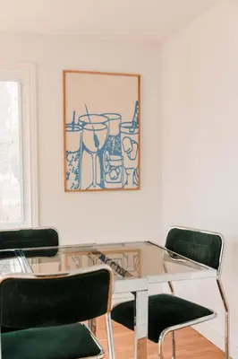 a dining room with a glass table and chairs at Town & Trail - Walkable Wellington Charmer in Wellington