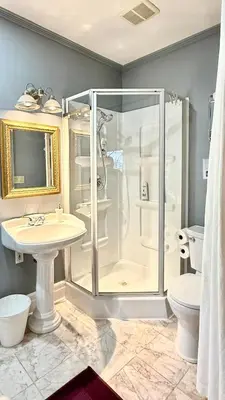 a bathroom with a shower and a sink at Two bedrooms unit with jacuzzi and great view in Niagara Falls