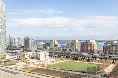 a view of a city with a baseball field at Work From home with Parking WIFI and CN Tower View in Toronto
