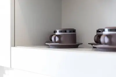 a shelf with three pots and pans on it at Cozy 1 BR Air mattress CN Tower Ent District MTCC in Toronto