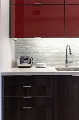 a kitchen with a sink and a counter top at 1 BR Furnished Condo with Balcony across CN Tower in Toronto