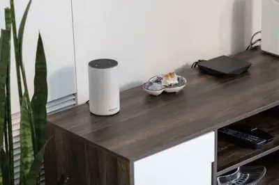 a wooden table with a bowl of food on it at Urban APT with Highspeed WiFi Near shopping malls in Toronto