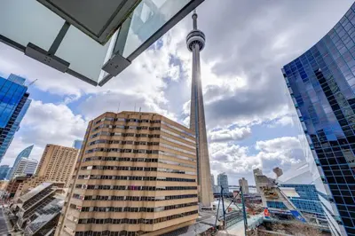 a view of the cn tower in a city at 2BR Fantastic View of CN Tower and Roger Centre in Toronto