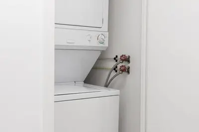 a kitchen with a white refrigerator and a microwave at Urban Lifestyle 1BR Suite w CN Tower and Lake view in Toronto