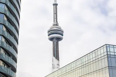 a view of the cn tower in toronto at Urban Lifestyle 1BR Suite w CN Tower and Lake view in Toronto