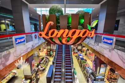 an overhead view of a lomo sign in a shopping mall at Cozy Downtown 2BR Suite near CN Tower with Balcony in Toronto