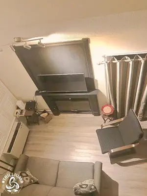 an overhead view of a living room with a couch at Blue Mountain, Collingwood - Loft Condo, sleeps 4 in Blue Mountains