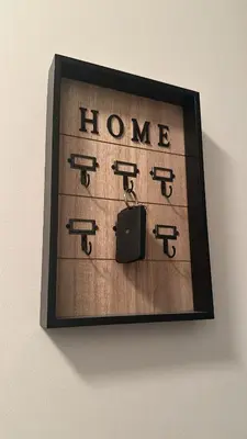 a picture of a framed picture of some guns at Downtown Toronto Condo Suite in Toronto