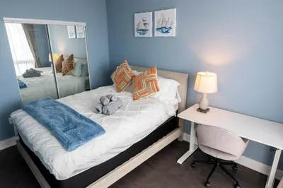 a bedroom with a bed with a teddy bear on it at Luxury view in Toronto Downtown 3 Bedroom 2.5 Bathroom 1 Parking in Toronto