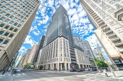 a tall building in the middle of a city at Luxury view in Toronto Downtown 3 Bedroom 2.5 Bathroom 1 Parking in Toronto