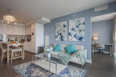 a living room with a couch and a table at Luxury view in Toronto Downtown 3 Bedroom 2.5 Bathroom 1 Parking in Toronto