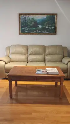 a living room with a couch and a coffee table at The Comfort Stay at City of Pickering in Pickering