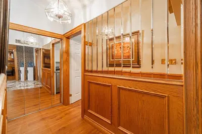 a home gym with a wood paneled wall at Waterfront - Kawartha Lakes in Kawartha Lakes
