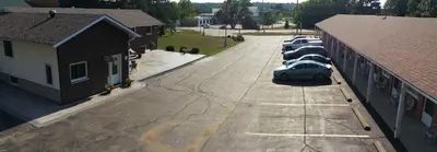 an aerial view of a parking lot next to a building at Wellington Inn in Bracebridge