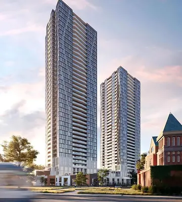 two tall buildings in a city with a street at 1BR Modern Condo - King Bed and Stunning City View in Kitchener