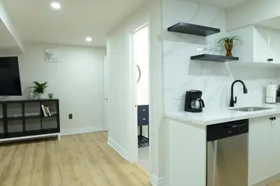 a kitchen with a sink and a counter top at Spacious 2-Bed-Room near Yonge & Major Mackenzie in Richmond Hill