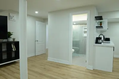 a room with a door leading to a bathroom at Spacious 2-Bed-Room near Yonge & Major Mackenzie in Richmond Hill