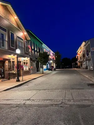 an empty street in a town at night at Cottage in Crystal Beach in Fort Erie