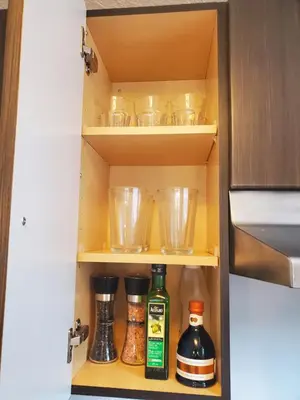 a cupboard filled with lots of bowls and utensils at The Cosmopolitan in Wortley Village in London