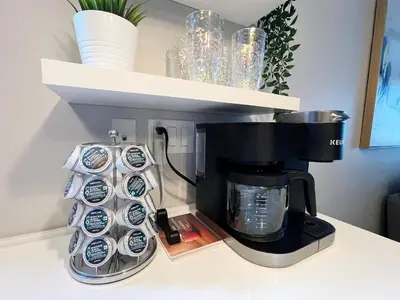 a coffee maker sitting on top of a counter at The Cosmopolitan in Wortley Village in London
