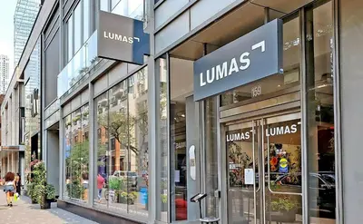 a store front of a store with glass windows at University of Toronto UTSG Suites in Toronto
