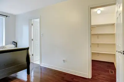 a room with a closet with a sink and a mirror at Luxury Home In Castlemore Brampton in Brampton