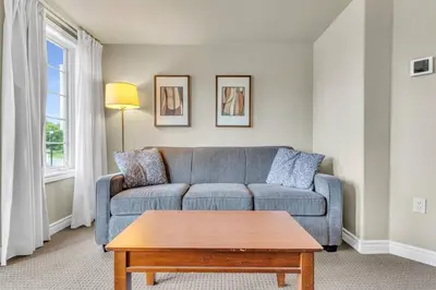 a living room with a couch and a coffee table at Spacious Hideaway in Nature in Edgar