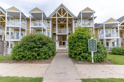 a large apartment building with a sign in front of it at Spacious Hideaway in Nature in Edgar