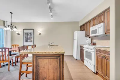 a kitchen with a sink and a counter top at Cozy Getaway with Resort Perks in Edgar
