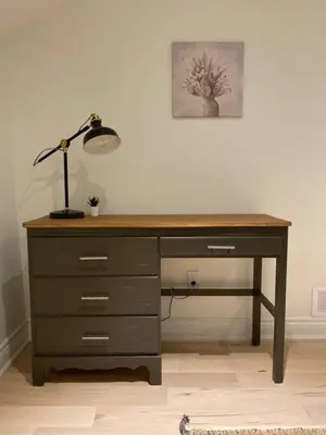 a desk with a lamp on top of it at Downtown Picton 3 bedroom in Picton