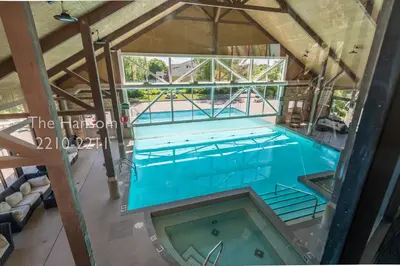 an overhead view of a swimming pool at Country Club Charm - 4-Bed Radiant Resort Condo in Edgar